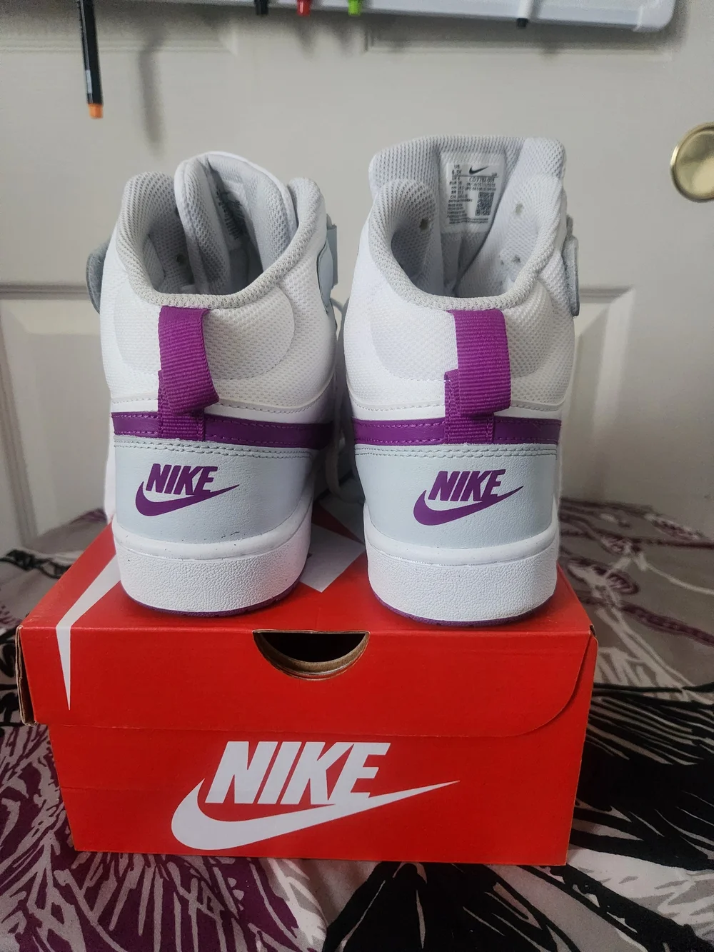Nike Youth High-Top Sneakers White with Purple Accents
